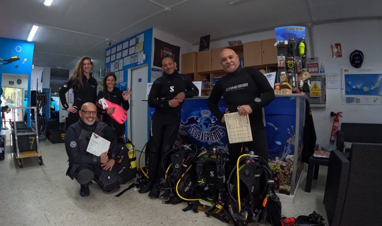 Assistant Instructor candidates with their instructors at the dive center
